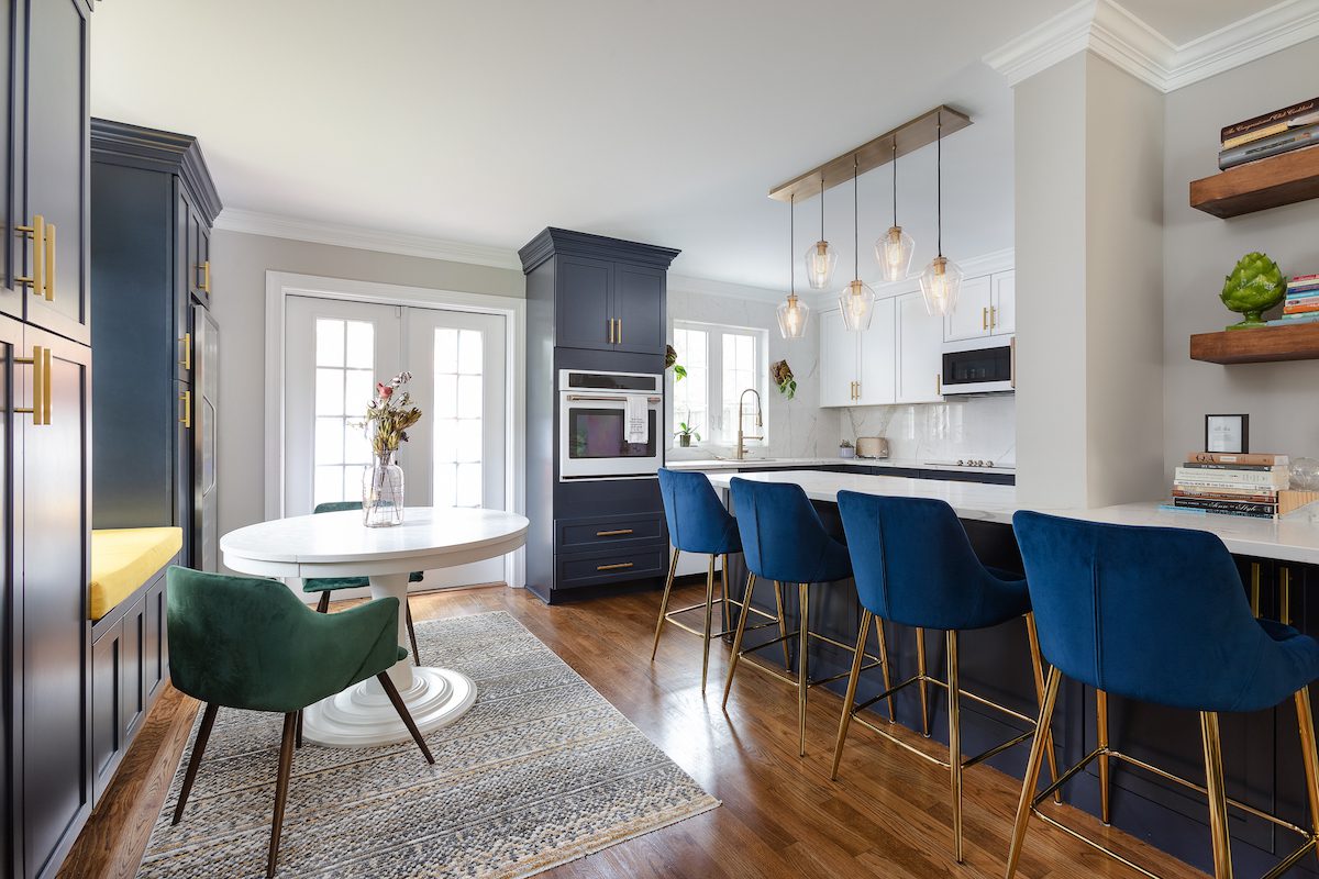 Photo showing Custom interior design with royal blue kitchen bar stool seating