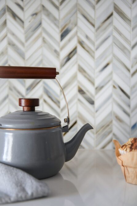Photo of a kitchen design project in Ashburn VA featuring a soothing gray and blue color palette