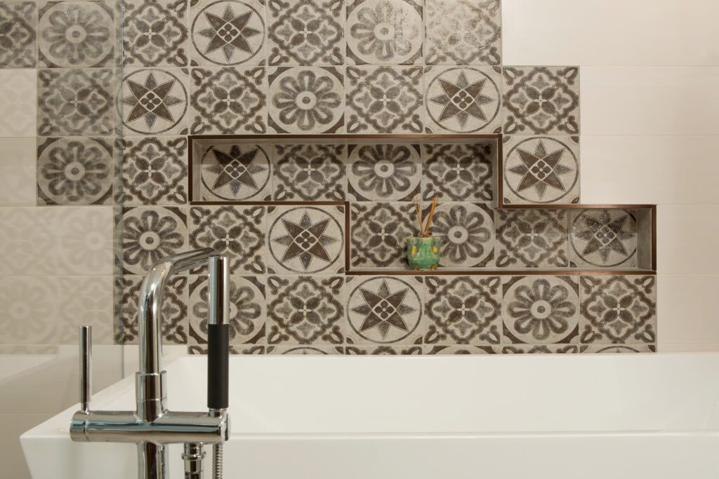 A photo of custom tile work in a European style bathroom